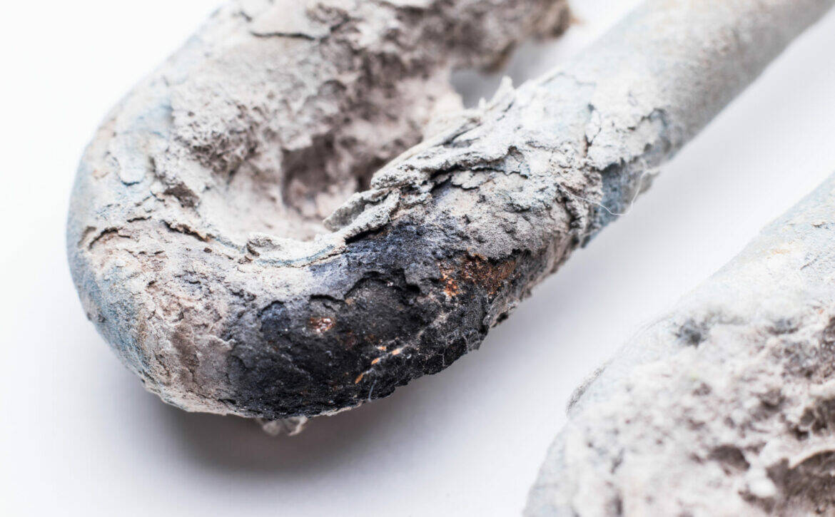 The heating element of the washing machine close-up. The cause o