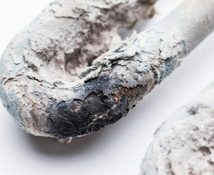 The heating element of the washing machine close-up. The cause o